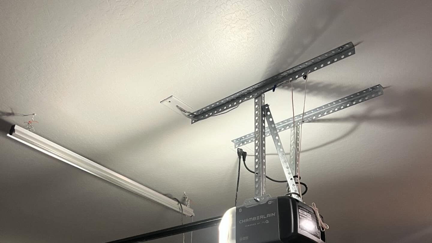 Chamberlain garage door opener mounted to a garage ceiling